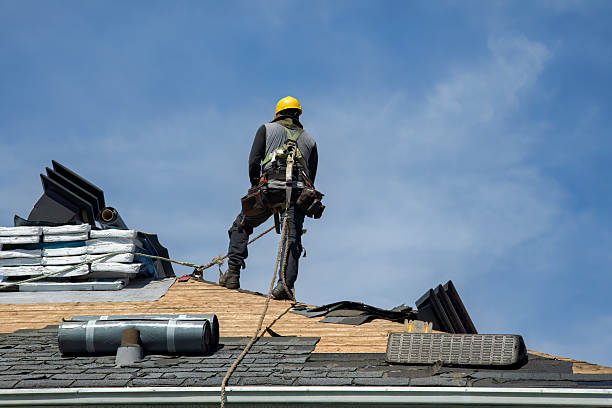 Professional Roofing technician working in Raywood, TX